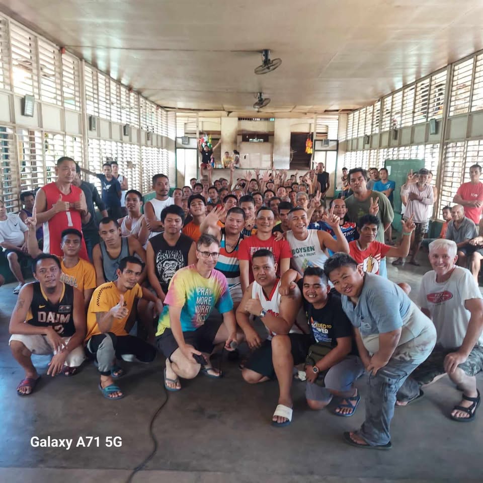 Kairos Prison Fellowship group gathered together in a hall